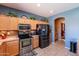 Spacious kitchen with stainless steel appliances and ample cabinetry at 1542 E Chaparral Pl, Casa Grande, AZ 85122