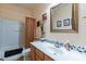 Clean bathroom with tub shower combination and mosaic tile at 1542 E Chaparral Pl, Casa Grande, AZ 85122