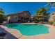 Inviting backyard pool with patio furniture at 1542 E Chaparral Pl, Casa Grande, AZ 85122