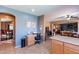 Kitchen with built-in desk and views into the Gathering room at 1542 E Chaparral Pl, Casa Grande, AZ 85122