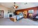 Bright bedroom with fireplace and built-in wooden cabinets at 1542 E Chaparral Pl, Casa Grande, AZ 85122