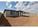 New home with a large backyard and covered patio at 40040 W Bravo Dr, Maricopa, AZ 85138