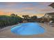 Inviting kidney-shaped pool with surrounding landscaping at 8723 E Hillview St, Mesa, AZ 85207