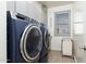 Convenient laundry room with washer, dryer, and storage at 331 W Dundy St, San Tan Valley, AZ 85143