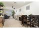 Versatile bonus room featuring a sitting area and dining table at 331 W Dundy St, San Tan Valley, AZ 85143