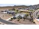 Aerial view of a house with a large backyard and desert landscape at 331 W Dundy St, San Tan Valley, AZ 85143