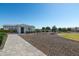 Backyard features a shed and a stone pathway at 331 W Dundy St, San Tan Valley, AZ 85143