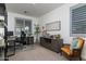 Functional home office with desk, chair, and ample storage at 331 W Dundy St, San Tan Valley, AZ 85143