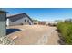 Large backyard with gravel and a shed at 331 W Dundy St, San Tan Valley, AZ 85143