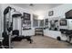 Well-equipped home gym with various exercise machines at 331 W Dundy St, San Tan Valley, AZ 85143