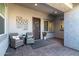 Charming entryway with comfortable seating and decorative wall art at 331 W Dundy St, San Tan Valley, AZ 85143