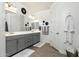 Double vanity bathroom with modern gray cabinets and ample counter space at 331 W Dundy St, San Tan Valley, AZ 85143
