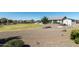 Landscaped backyard with circular lawn and rock features at 331 W Dundy St, San Tan Valley, AZ 85143