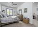Serene bedroom with a dresser and a wicker basket at 331 W Dundy St, San Tan Valley, AZ 85143