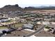 Aerial view of a residential neighborhood, showcasing various homes and desert landscape at 331 W Dundy St, San Tan Valley, AZ 85143