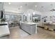 Spacious kitchen with island, modern appliances, and breakfast area at 331 W Dundy St, San Tan Valley, AZ 85143