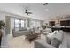 Spacious living area with open floor plan and kitchen access at 18083 W Amber Dr, Goodyear, AZ 85338