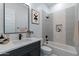 Modern bathroom with honeycomb tile and updated vanity at 18083 W Amber Dr, Goodyear, AZ 85338