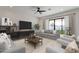 Living room boasts modern decor, and access to backyard at 18083 W Amber Dr, Goodyear, AZ 85338