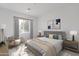 Comfortable bedroom with neutral decor and ample natural light at 18083 W Amber Dr, Goodyear, AZ 85338