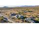 Aerial view showing the house and surrounding desert landscape at 1894 W Scissor Tail Pl, Queen Valley, AZ 85118