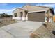 New construction home, two-car garage, desert landscaping at 4667 N 177Th Dr, Goodyear, AZ 85395