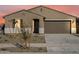 Single story home with two car garage and neutral color scheme at 4667 N 177Th Dr, Goodyear, AZ 85395