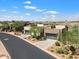 Modern home with stone elevation and attached two-car garage at 16076 E Ridgestone Dr, Fountain Hills, AZ 85268