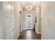 Elegant entryway with chandelier and view to living room at 16076 E Ridgestone Dr, Fountain Hills, AZ 85268