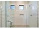 Large walk-in shower with subway tile and dual shower heads at 16076 E Ridgestone Dr, Fountain Hills, AZ 85268