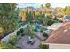 Aerial view showcasing a desert landscape, pool, and expansive backyard at 9008 E Friess Dr, Scottsdale, AZ 85260