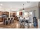 Kitchen with island, breakfast nook, and stainless steel appliances at 16079 W Williams St, Goodyear, AZ 85338