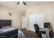 Spacious bedroom with king-size bed and home office at 16079 W Williams St, Goodyear, AZ 85338