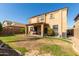 Two story house with backyard and covered patio at 16079 W Williams St, Goodyear, AZ 85338