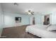 Main bedroom with light walls, carpeted floors, and a ceiling fan at 16079 W Williams St, Goodyear, AZ 85338