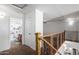Upstairs hallway with access to bathroom and bedrooms at 16079 W Williams St, Goodyear, AZ 85338