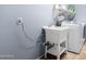 Laundry room with utility sink, washer, and dryer hookups at 16079 W Williams St, Goodyear, AZ 85338