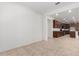 Open dining area with views into a well-appointed kitchen at 14436 W Faye Way, Surprise, AZ 85387