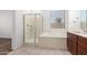 Double sink bathroom with soaking tub and shower at 14436 W Faye Way, Surprise, AZ 85387