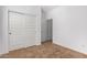 Bedroom with double door closet and carpet flooring at 14436 W Faye Way, Surprise, AZ 85387
