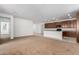 Modern kitchen with dark wood cabinets, granite countertops, and an island at 14436 W Faye Way, Surprise, AZ 85387
