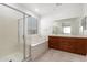 Bathroom with double vanity and a large shower at 14436 W Faye Way, Surprise, AZ 85387