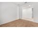 Spacious carpeted bedroom with an open doorway to the hallway at 14436 W Faye Way, Surprise, AZ 85387