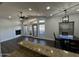 Spacious living room with hardwood floors, fireplace and large windows at 14000 N 94Th St # 1037, Scottsdale, AZ 85260