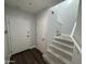 Bright entryway with staircase, coat rack, and neutral-toned flooring at 14000 N 94Th St # 1037, Scottsdale, AZ 85260