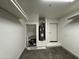 Garage with water heater, shelving and extra storage at 14000 N 94Th St # 1037, Scottsdale, AZ 85260