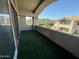 Private balcony with artificial turf and community views at 14000 N 94Th St # 1037, Scottsdale, AZ 85260