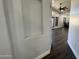 Hallway with built-in shelving and wood-look floors at 14000 N 94Th St # 1037, Scottsdale, AZ 85260