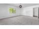 Bright bedroom with double sliding doors and a large window at 930 W Maryland Ave, Phoenix, AZ 85013