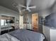 Main bedroom with king bed, ceiling fan, and large closet at 650 N Hawes Rd # 3820, Mesa, AZ 85207